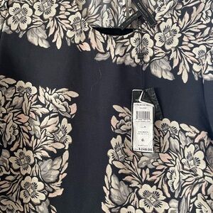 EUC - laundered but not worn. Black, beige, hints of pink as shown